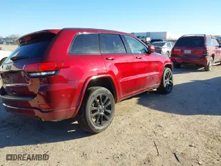 2021 Jeep Grand Cherokee Laredo X with VIN 1C4RJEAG5MC798416, listed as a IAAI auction lot 41219060 with 47,632 mi miles. Bid and sale history available at carsss.com. Image 4.