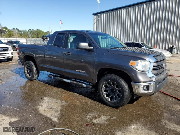 2015 Toyota Tundra 2WD Truck SR with VIN 5TFRM5F10FX092610, listed as a Copart auction lot 48179375 with 104,354 mi miles and Salvage Title. Bid and sale history available at carsss.com. Image 4.