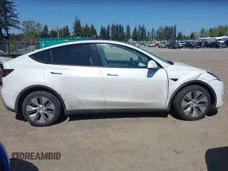 2022 Tesla Model Y Long Range z VIN 7SAYGDEE7NF418223, wystawiony jako IAAI lot #42046651 z przebiegiem 18 724 mil mil oraz . Historia ofert i sprzedaży dostępna na DreamBid. Obrazek 14.