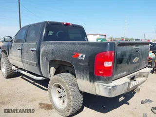 2007 Chevrolet Silverado 1500 LTZ with VIN 3GCEK13Y27G512274, listed as a IAAI auction lot 41793222 with 165,163 mi miles. Bid and sale history available at carsss.com. Image 3.
