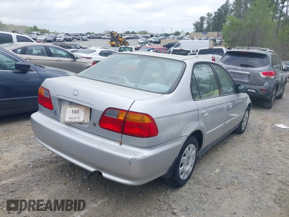 2000 Honda Civic VP with VIN 2HGEJ6611YH524336, listed as a IAAI auction lot 41957499 with 160,638 mi miles. Bid and sale history available at carsss.com. Image 4.