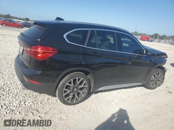 2022 BMW X1 sDrive28i with VIN WBXJG7C03N5U52669, listed as a Copart auction lot 87806305 with 27,609 mi miles and Salvage Title. Bid and sale history available at carsss.com. Image 3.