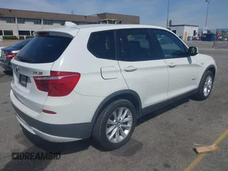 2014 BMW X3 xDrive28i with VIN 5UXWX9C51E0D09485, listed as a IAAI auction lot 41831582 with 103,953 mi miles and . Bid and sale history available at DreamBid. Image 4.