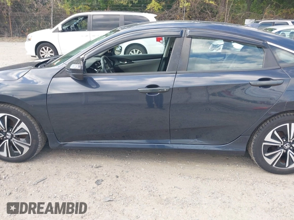 2016 Honda Civic Sedan EX-L with VIN 19XFC1F79GE209864, listed as a IAAI auction lot 40224466 with 176,897 mi miles. Bid and sale history available at carsss.com. Image 14.