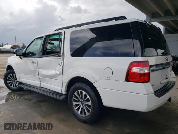 2015 Ford Expedition EL XLT with VIN 1FMJK1HTXFEF13525, listed as a Copart auction lot 68974014 with 69,489 mi miles and Salvage Title. Bid and sale history available at carsss.com. Image 2.