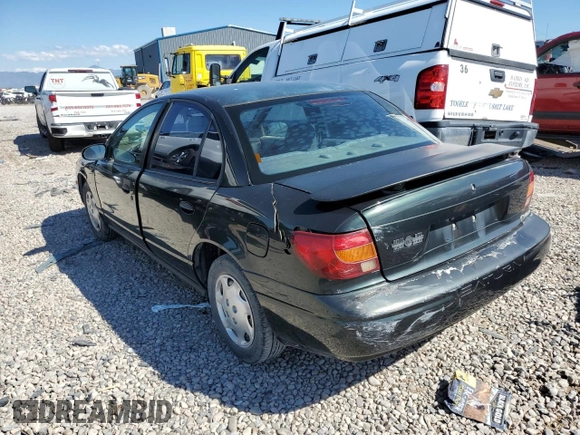 2000 Saturn SL with VIN 1G8ZH5285YZ240565, listed as a Copart auction lot 66567153 with 202,109 mi miles and Salvage title. Bid and sale history available at DreamBid. Image 2.