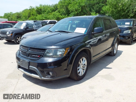2015 Dodge Journey SXT with VIN 3C4PDCBG2FT718451, listed as a IAAI auction lot 42039821 with 198,695 mi miles and . Bid and sale history available at DreamBid. Image 2.