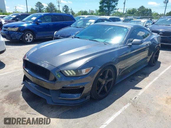 2015 Ford Mustang EcoBoost z VIN 1FA6P8TH5F5351476, wystawiony jako IAAI lot #42157688 z przebiegiem 134 131 mil mil oraz . Historia ofert i sprzedaży dostępna na DreamBid. Obrazek 21.