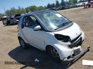 2012 Smart fortwo Pure z VIN WMEEJ3BAXCK563660, wystawiony jako IAAI lot #42165195 z przebiegiem 53 809 mil mil oraz . Historia ofert i sprzedaży dostępna na DreamBid. Obrazek 1.