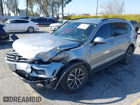 2021 Volkswagen Tiguan S with VIN 3VV1B7AX6MM131036, listed as a IAAI auction lot 41742604 with 55,155 mi miles and . Bid and sale history available at DreamBid. Image 18.