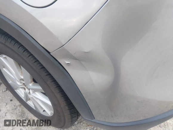 2015 Mazda CX-5 Touring with VIN JM3KE2CYXF0435583, listed as a IAAI auction lot 41737810 with 107,270 mi miles and . Bid and sale history available at DreamBid. Image 19.