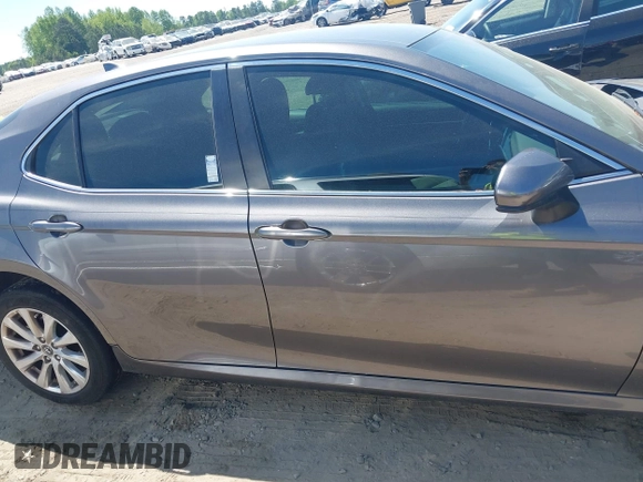 2019 Toyota Camry LE z VIN 4T1B11HK4KU797720, wystawiony jako IAAI lot #42053830 z przebiegiem 102 558 mil mil oraz . Historia ofert i sprzedaży dostępna na DreamBid. Obrazek 13.