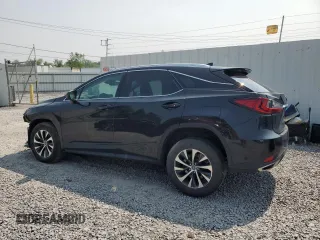 2020 Lexus RX 350 with VIN 2T2HZMDA5LC228570, listed as a Copart auction lot 60643225 with 134,118 mi miles and Salvage title. Bid and sale history available at DreamBid. Image 2.