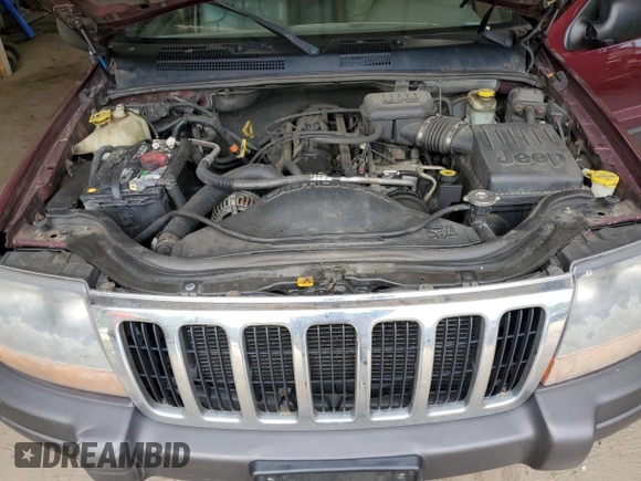 2001 Jeep Grand Cherokee Laredo z VIN 1J4GW48S11C609344, wystawiony jako Copart lot #59258245 z przebiegiem 162 141 mil mil oraz Szkoda całkowita • Salvage title. Historia ofert i sprzedaży dostępna na DreamBid. Obrazek 12.