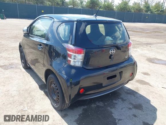 2012 Scion iQ with VIN JTNJJXB03CJ018302, listed as a IAAI auction lot 42000097 with 191,918 mi miles. Bid and sale history available at carsss.com. Image 3.