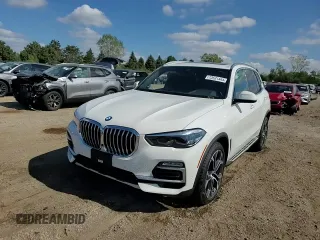 2021 BMW X5 xDrive40i with VIN 5UXCR6C09M9F71460, listed as a Copart auction lot 73531444 with 26,066 mi miles and Salvage title. Bid and sale history available at DreamBid. Image 13.