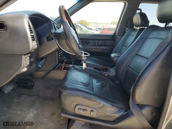 2003 Infiniti QX4 Luxury with VIN JNRDR09Y23W302861, listed as a Copart auction lot 79722354 with 204995 miles and Salvage Title. Bid and sale history available at carsss.com. Image 7.