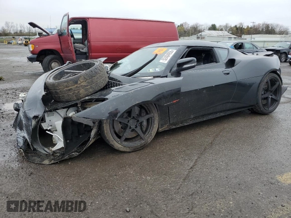 2021 Lotus Evora GT z VIN SCCLMDDN5MHA10403, wystawiony jako Copart lot #52484955 z przebiegiem Nie podano mil oraz Szkoda całkowita • Salvage title. Historia ofert i sprzedaży dostępna na DreamBid. Obrazek 1.
