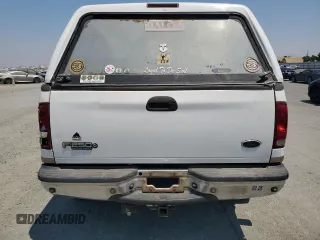 2002 Ford F-250 XL с VIN 1FTNX21F62EB72958, выставлен на аукционе Copart как лот 64620005 с пробегом 167 707 миль миль и Списание • Salvage title. История ставок и продаж доступна на DreamBid. Изображение 6.
