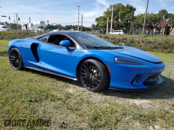 2020 McLaren GT z VIN SBM22GCA8LW000692, wystawiony jako Copart lot #44749324 z przebiegiem 18 911 mil mil oraz Nie do naprawy. Historia ofert i sprzedaży dostępna na DreamBid. Obrazek 4.