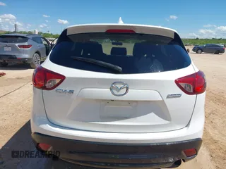2016 Mazda CX-5 Touring z VIN JM3KE2CY0G0840918, wystawiony jako IAAI lot #42205529 z przebiegiem 74 515 mil mil oraz . Historia ofert i sprzedaży dostępna na DreamBid. Obrazek 16.