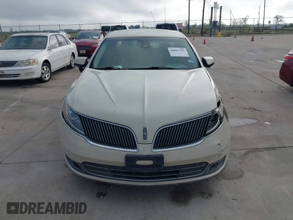 2015 Lincoln MKS with VIN 1LNHL9DKXFG607951, listed as a IAAI auction lot 40807752 with 207,097 mi miles. Bid and sale history available at carsss.com. Image 11.