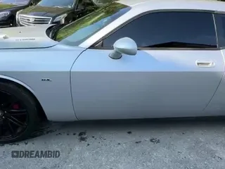 2009 Dodge Challenger SRT-8 z VIN 2B3LJ74WX9H527099, wystawiony jako Copart lot #83948295 z przebiegiem 93 834 mil mil oraz Czysty tytuł • Clean title. Historia ofert i sprzedaży dostępna na DreamBid. Obrazek 11.