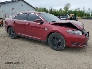 2015 Ford Taurus SEL with VIN 1FAHP2H84FG102122, listed as a Copart auction lot 57792735 with 139,288 mi miles and Clean title. Bid and sale history available at DreamBid. Image 4.