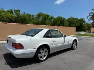1999 Mercedes-Benz SL 500 z VIN WDBFA68F3XF176338, wystawiony jako Copart lot #58926205 z przebiegiem 46 967 mil mil oraz Tytuł czysty. Historia ofert i sprzedaży dostępna na DreamBid. Obrazek 4.