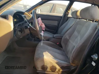 1995 Toyota Camry LE with VIN JT2GK12E2S0079545, listed as a Copart auction lot 84058164 with 150,539 mi miles and Salvage Title. Bid and sale history available at carsss.com. Image 7.