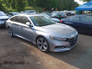 2020 Honda Accord Touring z VIN 1HGCV2F93LA017701, wystawiony jako IAAI lot #42383938 z przebiegiem 40 945 mil mil oraz . Historia ofert i sprzedaży dostępna na DreamBid. Obrazek 1.