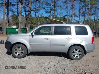 2010 Honda Pilot Touring with VIN 5FNYF4H91AB020868, listed as a IAAI auction lot 41783104 with 298,022 mi miles and . Bid and sale history available at carsss.com. Image 14.