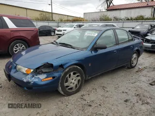 2000 Saturn SL z VIN 1G8ZK5276YZ238736, wystawiony jako Copart lot #80936244 z przebiegiem 94 560 mil mil oraz Szkoda całkowita • Salvage title. Historia ofert i sprzedaży dostępna na DreamBid. Obrazek 1.