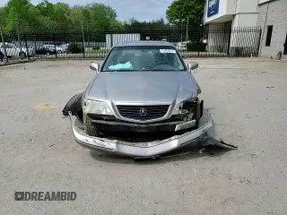 2002 Acura RL z VIN JH4KA96542C007840, wystawiony jako Copart lot #53459615 z przebiegiem Nie podano mil oraz Szkoda całkowita • Salvage title. Historia ofert i sprzedaży dostępna na DreamBid. Obrazek 13.