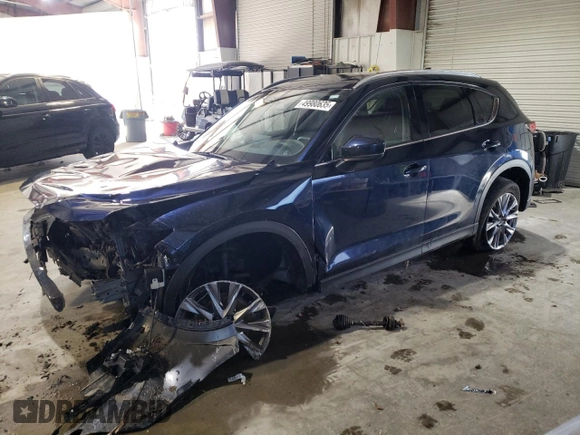 2021 Mazda CX-5 Grand Touring with VIN JM3KFBDM3M0327635, listed as a Copart auction lot 49980635 with 47,160 mi miles and Salvage Title. Bid and sale history available at carsss.com. Image 1.