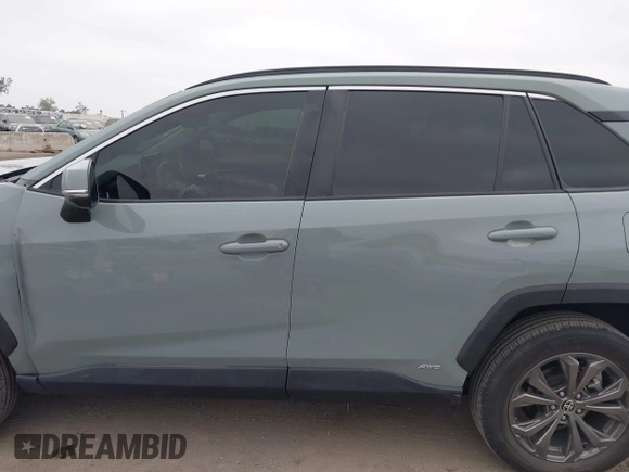 2022 Toyota RAV4 Hybrid XLE Premium with VIN 4T3B6RFV8NU102695, listed as a IAAI auction lot 42385078 with 35,614 mi miles and . Bid and sale history available at DreamBid. Image 14.