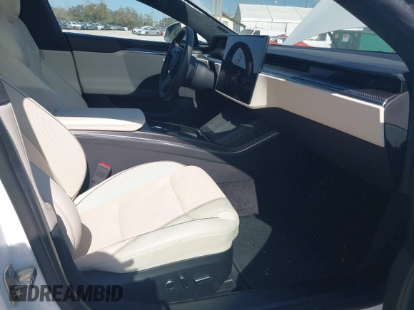 2022 Tesla Model S Plaid with VIN 5YJSA1E64NF484904, listed as a IAAI auction lot 41594464 with 25,299 mi miles and . Bid and sale history available at DreamBid. Image 5.