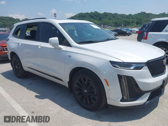 2021 Cadillac XT6 Sport with VIN 1GYKPGRS4MZ222263, listed as a IAAI auction lot 42443907 with 18,353 mi miles and . Bid and sale history available at DreamBid. Image 1.