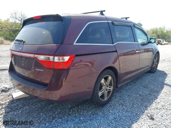 2013 Honda Odyssey Touring with VIN 5FNRL5H96DB037947, listed as a IAAI auction lot 41813910 with 231,920 mi miles. Bid and sale history available at carsss.com. Image 4.
