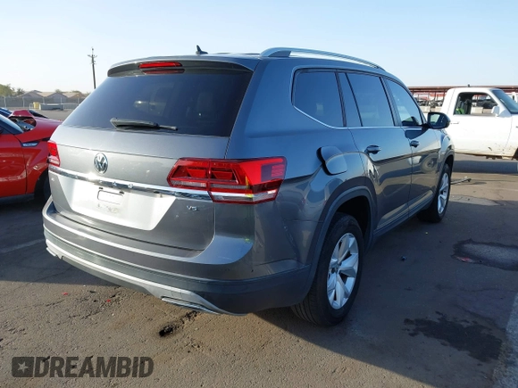 2018 Volkswagen Atlas SE with VIN 1V2DR2CA8JC502499, listed as a IAAI auction lot 41562852 with 142,362 mi miles and . Bid and sale history available at DreamBid. Image 4.
