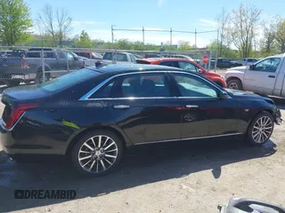 2017 Cadillac CT6 Luxury AWD z VIN 1G6KD5RS5HU133097, wystawiony jako IAAI lot #42144553 z przebiegiem 167 460 mil mil oraz . Historia ofert i sprzedaży dostępna na DreamBid. Obrazek 14.