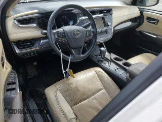 2014 Toyota Avalon Limited z VIN 4T1BD1EB9EU032227, wystawiony jako Copart lot #57016995 z przebiegiem 210 611 mil mil oraz Szkoda całkowita • Salvage title. Historia ofert i sprzedaży dostępna na DreamBid. Obrazek 8.
