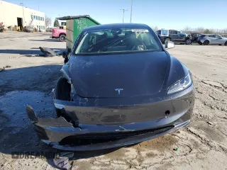 2025 Tesla Model 3 Long Range with VIN 5YJ3E1EA2SF932453, listed as a Copart auction lot 46695905 with 1,673 mi miles and Salvage Title. Bid and sale history available at carsss.com. Image 5.