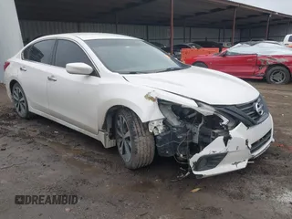 2016 Nissan Altima SR with VIN 1N4AL3AP7GC277879, listed as a IAAI auction lot 41523475 with 128,821 mi miles and . Bid and sale history available at carsss.com. Image 1.