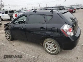 2009 Pontiac Vibe w/1SB with VIN 5Y2SP670X9Z451927, listed as a Copart auction lot 85680664 with 309,210 mi miles and Salvage Title. Bid and sale history available at carsss.com. Image 2.