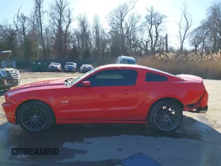2013 Ford Mustang GT with VIN 1ZVBP8CFXD5215667, listed as a IAAI auction lot 41525268 with 129,561 mi miles and . Bid and sale history available at DreamBid. Image 14.
