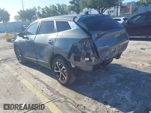 2023 Kia Sportage EX with VIN 5XYK33AF6PG117445, listed as a IAAI auction lot 42252081 with 18,070 mi miles and . Bid and sale history available at DreamBid. Image 3.