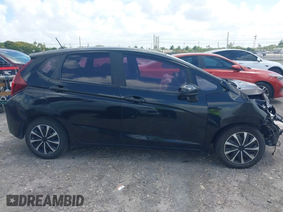 2016 Honda Fit LX with VIN JHMGK5H58GX002388, listed as a IAAI auction lot 41957350 with 127,211 mi miles. Bid and sale history available at carsss.com. Image 13.