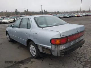1994 Toyota Camry LE with VIN JT2SK12E2R0207688, listed as a IAAI auction lot 41323827 with 162,680 mi miles. Bid and sale history available at carsss.com. Image 3.