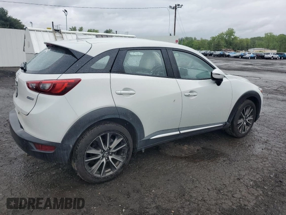 2016 Mazda CX-3 Grand Touring z VIN JM1DKBD77G0105451, wystawiony jako Copart lot #58341495 z przebiegiem 109 525 mil mil oraz Szkody całkowita. Historia ofert i sprzedaży dostępna na DreamBid. Obrazek 3.